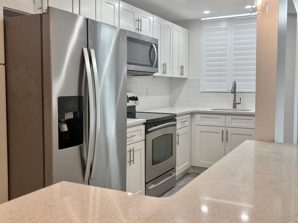 Photo of 104 Paradise Harbour Blvd #205, North Palm Beach, FL 33408 (MLS # R11020209)