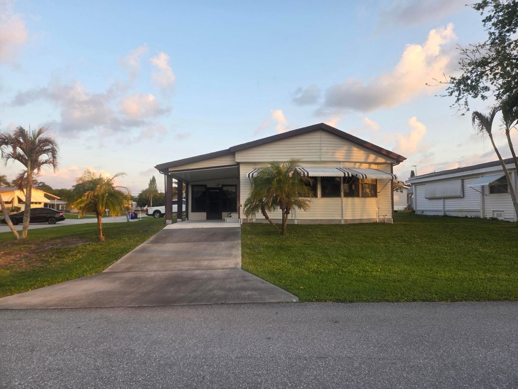 Photo of 7107 SE Seahawk Street, Hobe Sound, FL 33455 (MLS # B26007085)