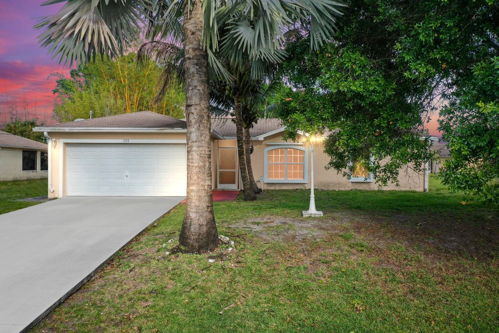 Photo of 1737 SW Boeing Street, Port Saint Lucie, FL 34953 (MLS # R10786199)