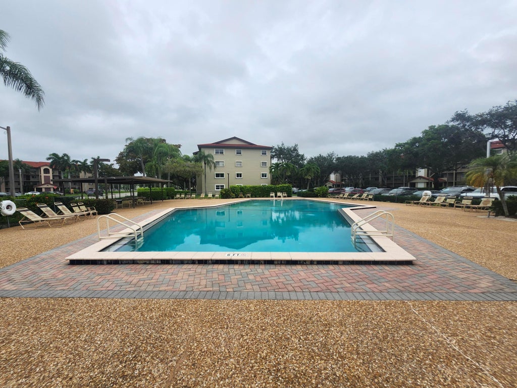 Photo of 1100 SW 128th Terrace SW #209 U, Pembroke Pines, FL 33027 (MLS # B26038159)