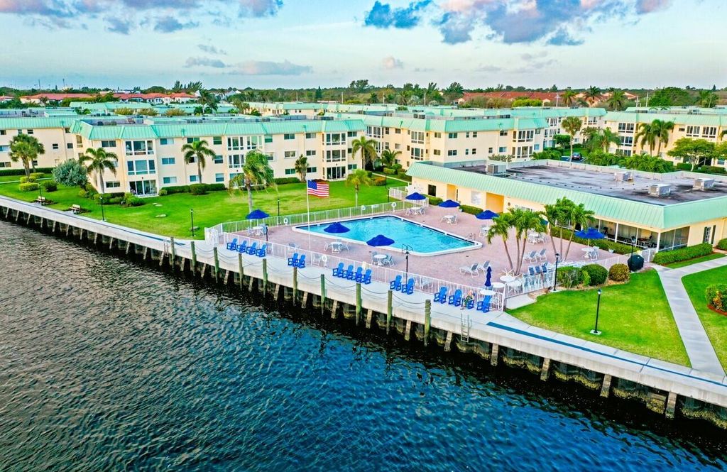 Photo of 18 Colonial Club Drive #205, Boynton Beach, FL 33435 (MLS # R10968849)