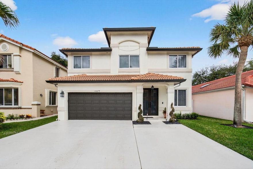 Welcome to 10679 Palm Spring Dr, a beautifully updated 4-bedroom, 2.5 bath, two-story home with Bonus room providing additional flexible living space. Thoughtful upgrades and modern finishes come together inside and out. From the moment you arrive, the extended driveway, new fencing, and lush 2025 landscaping with updated irrigation sets the tone for pride of ownership. The backyard is a true retreat, featuring a saltwater, heated pool with travertine decking (2021-2022), new pavers (2023), and stylish pots with a fountain added in 2025—perfect for relaxing or entertaining year-round. Inside, the home has been extensively renovated. The kitchen was completely updated in 2022 with white shaker cabinets, quartz countertops, and Samsung stainless steel appliances. New flooring throughout (2022-2023) The first floor features laminate flooring in French Vanilla color, while the second floor offers luxury vinyl plank flooring in Agrigento color. Fresh interior paint (2023) create a bright, cohesive feel. All interior doors were replaced in 2022, and every closet has been upgraded with custom Delta Closet systems. The primary bedroom was fully redone in 2022, offering a modern, comfortable retreat.

Major systems have been updated for peace of mind, including two newer AC units (2022 & 2023), electric panel (2022), water heater (2022), impact-rated, insulated garage door (2023), and impact windows and doors (2021). Additional improvements include a 2019 roof, gutters, updated exterior paint (2022), and newer LG washer and dryer (2022). This move-in-ready home blends style, function, and quality upgrades throughout ideal for modern living.