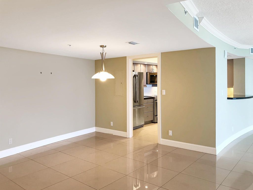 Photo of 3000 N Ocean Drive #23-E, Singer Island, FL 33404 (MLS # R10908224)