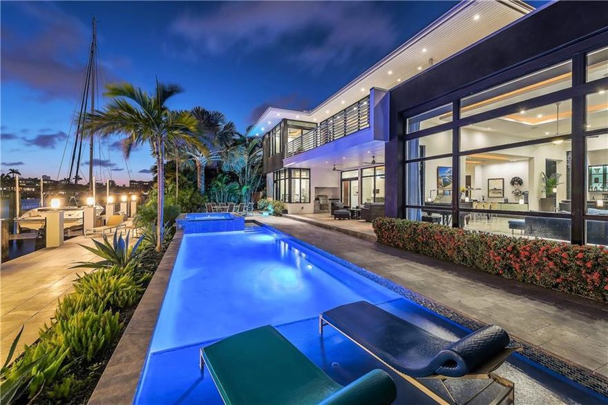 Located in the private, 24/7 police guarded community of Sunrise Key, on the wide water of Rio Barcelona.  Enjoy 95 feet of water frontage and a fully finished concrete dock ready for a yacht up to 75 feet.  Built in 2014, this property features finishes such as: 2 Master Bedrooms, a great room with a gas fireplace, full bar, open living space with endless views perfect for entertaining, Turkish marble flooring inside and out, a central vac system, sound/security system, 3 car garage, summer kitchen, natural gas stove and generator.This home is beautifully finished, inside and out, and some of the nicest residential views Fort Lauderdale has to offer.