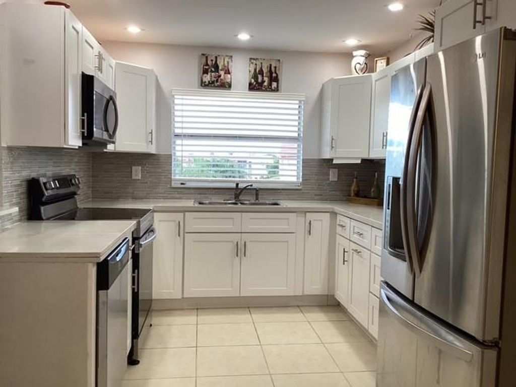 Photo of 9481 Sunrise Lakes Blvd #303, Sunrise, FL 33322 (MLS # F10540058)