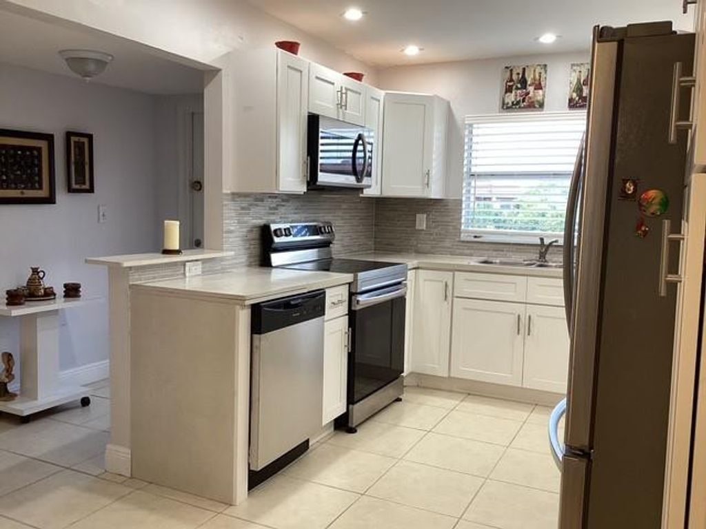 Photo of 9481 Sunrise Lakes Boulevard #303, Sunrise, FL 33322 (MLS # F10540058)