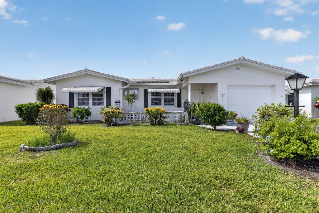Photo of 1104 W Ocean Avenue, Boynton Beach, FL 33426 (MLS # B26009545)