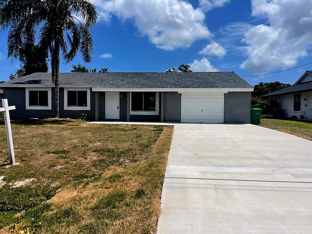 Photo of 2365 SE Aneci Street, Port Saint Lucie, FL 34984 (MLS # R11082329)
