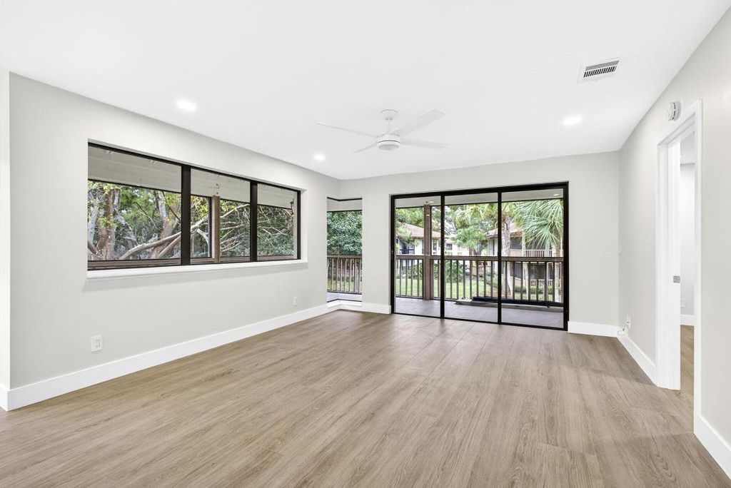 Photo of 147 Brackenwood Road, Palm Beach Gardens, FL 33418 (MLS # R11155581)