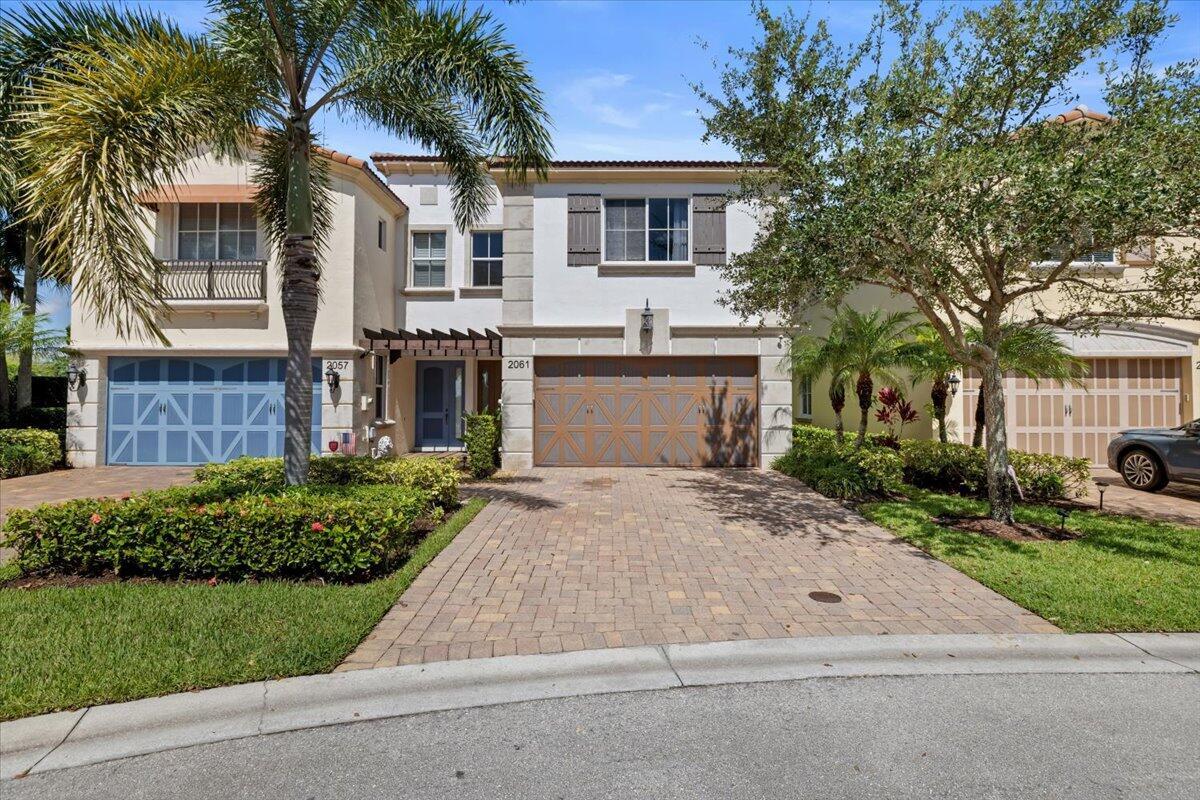 Spacious & Upgraded 3-Bedroom Townhouse with Loft in Gated Community - 2,278 Sq Ft Under Air Step into this beautifully upgraded 3-bedroom, 2.5-bath townhouse with a large loft and a 2-car garage, located in a secure gated community. Offering 2,278 sq ft under air, this home is larger than many single-family residences and features thoughtful upgrades throughout. The open, oversized kitchen is a chef's dream, complete with stainless steel appliances and a built-in sectional breakfast sitting area. The first floor large tile flooring, while the second floor features new laminate flooring and modern iron railings. Upstairs, you'll find a convenient laundry room with a full-size washer and dryer.