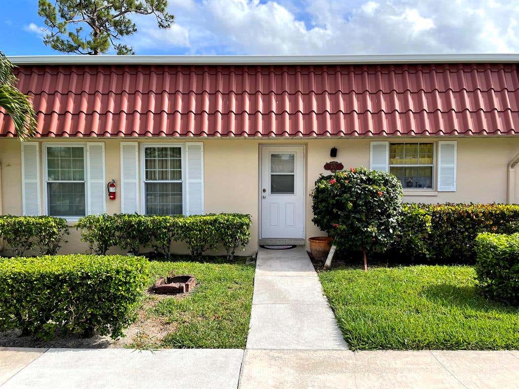 Photo of 671 Laconia Circle, Lake Worth, FL 33467 (MLS # R10717501)