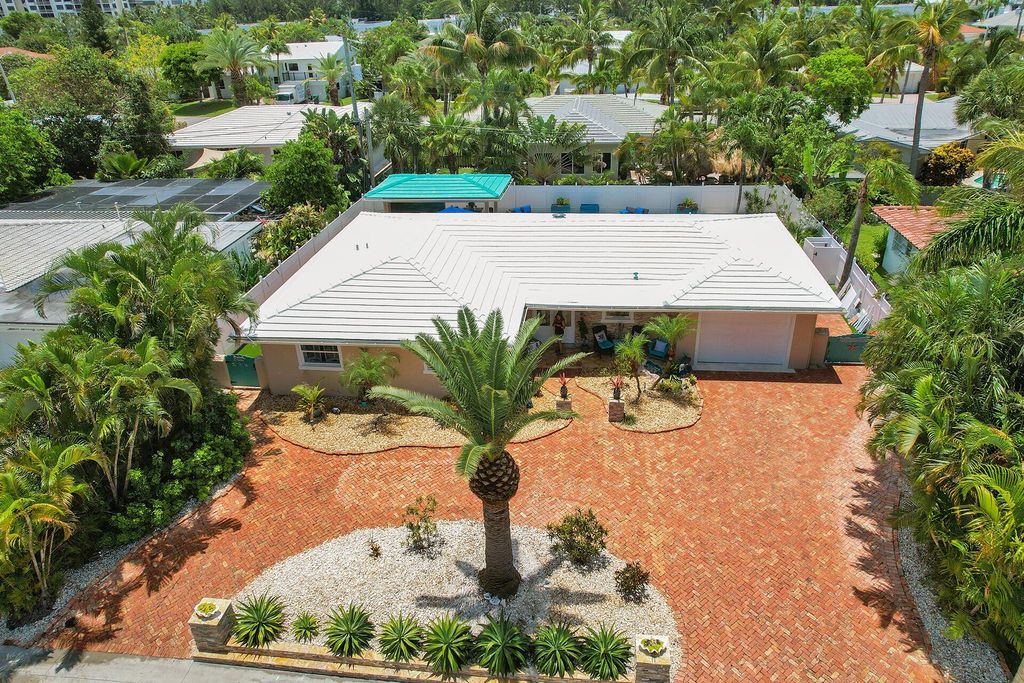 Photo of 1261 Manor Drive, Riviera Beach, FL 33404 (MLS # R10908419)