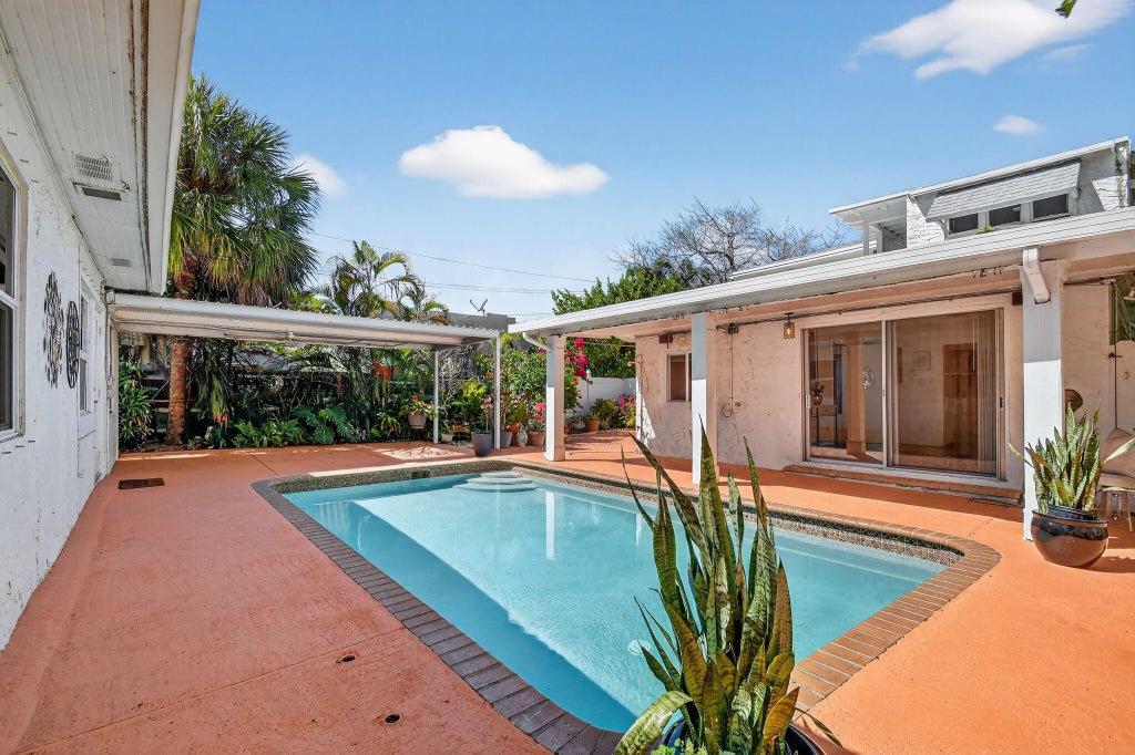 Photo of 328 Monroe Drive, West Palm Beach, FL 33405 (MLS # B26076791)