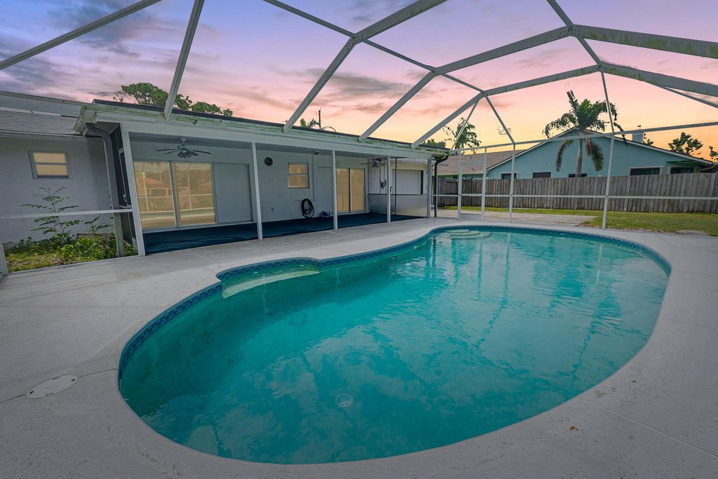 Photo of 417 SE Verada Avenue, Port Saint Lucie, FL 34983 (MLS # B26019965)