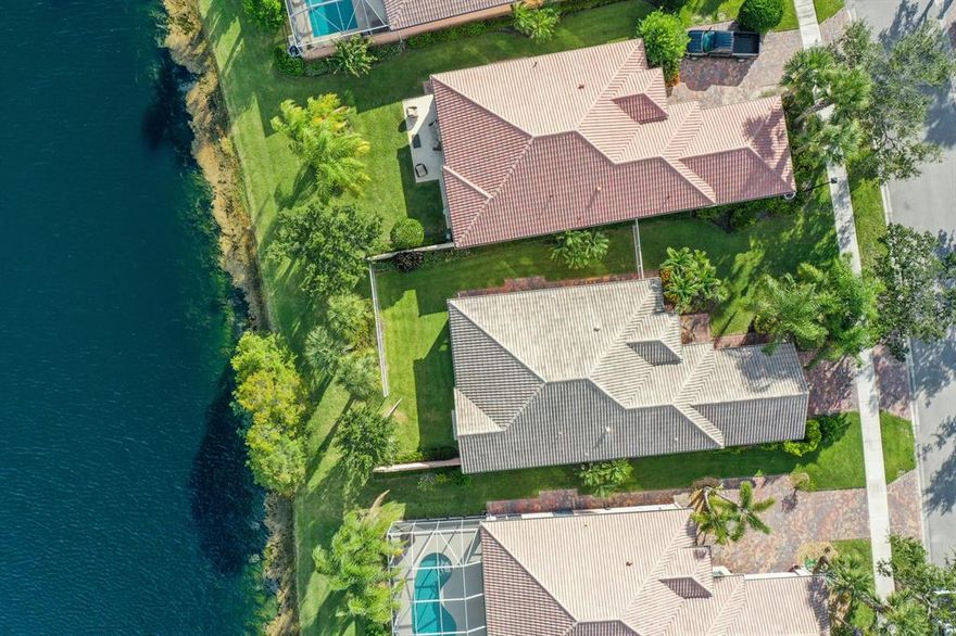 Beautiful Waterfront home in Lakes at Tradition featuring 3 bedrooms + Den, Lake view, newly Fenced yard! This home offers covered screen front porch & screened lanai. porcelain tiled living area & laminate flooring in the Den & Primary BR Suite, Renovated opened kitchen boasts single basin sink, 2020 SS appliances, tiled back splash, & under counter wainscoting. 2016 A/C, 2014 water heater. Full Hurricane protection incl full Panels & Accordion shutters on Primary BR sliders. Plantation shutters complete the den & guest bedroom windows. Rent includes basic cable, internet too!