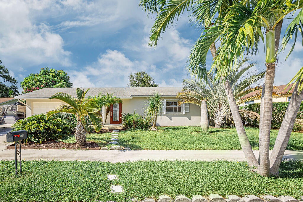 Photo of 1750 16TH Avenue N, Lake Worth Beach, FL 33460 (MLS # B26073174)