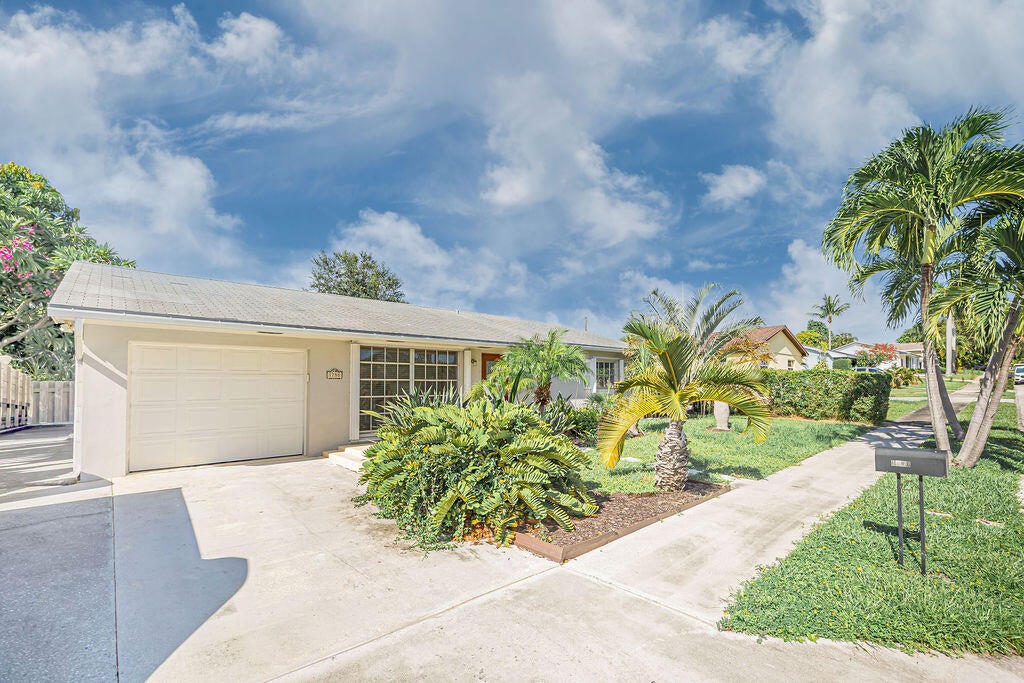 Photo of 1750 16TH Avenue N, Lake Worth Beach, FL 33460 (MLS # B26073174)