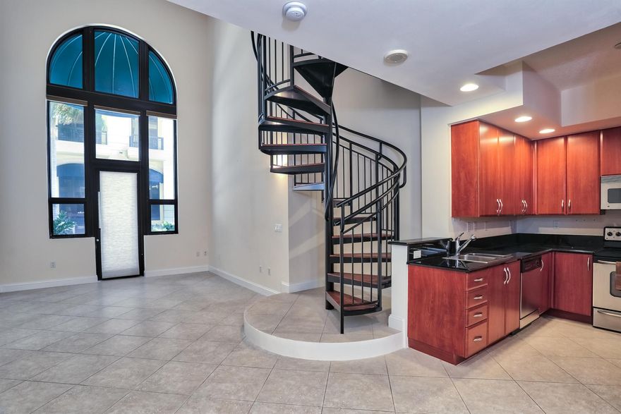 Loft Style Residence offering the best of Downtown West Palm Beach Luxury Living! One City Plaza Work/Live Residence 12o offers 26' Ceiling Height with North Exposure and First Floor Entrance for RESIDENTIAL/COMMERCIAL use! Unique One Bedroom 1.5 bath Residence features Contemporary open floor plan. Assigned Secure Premium Parking within Building and Storage. Enjoy the rooftop Resort Pool/Spa, Valet Parking, 24 hour staffed Lobby. 5 Star Amenities! The Rooftop Resort Pool/Spa offers Panoramic Views of Intracoastal, Ocean and Palm Beach Island. 100% West Palm Beach Walkability, A Full Service Building, and less than 10 minutes from Palm Beach International Airport.   Pets Considered.