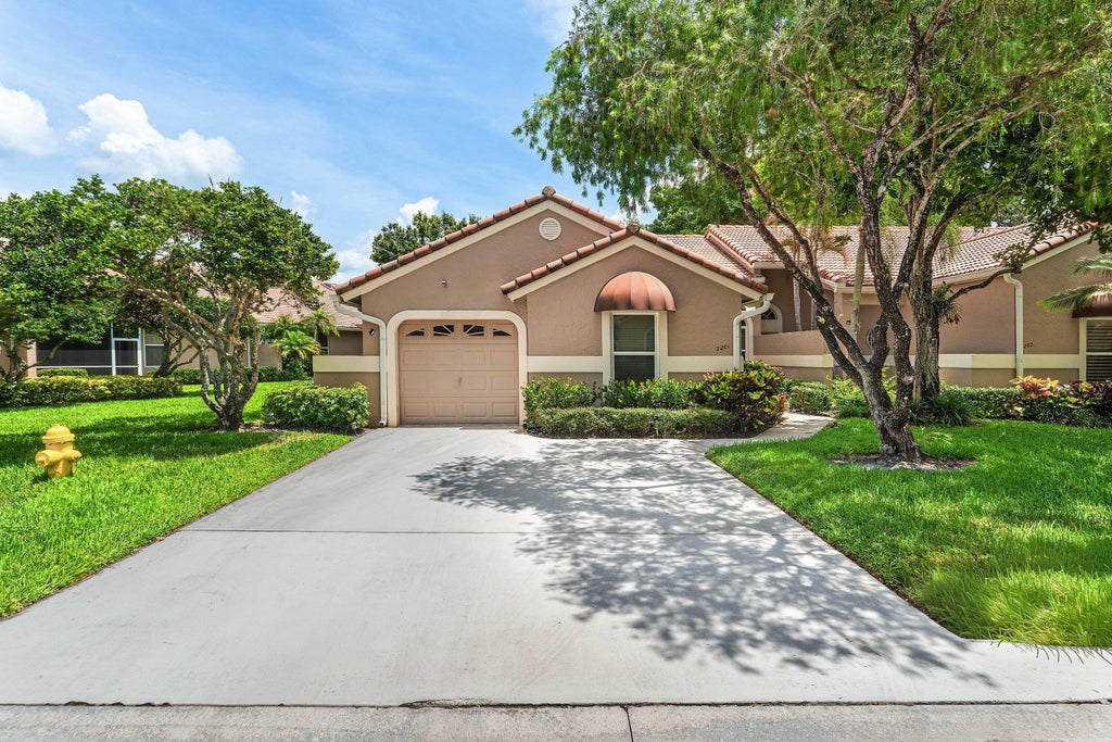 Photo of 2201 HEATHER RUN Terrace, Palm Beach Gardens, FL 33418 (MLS # B26059036)