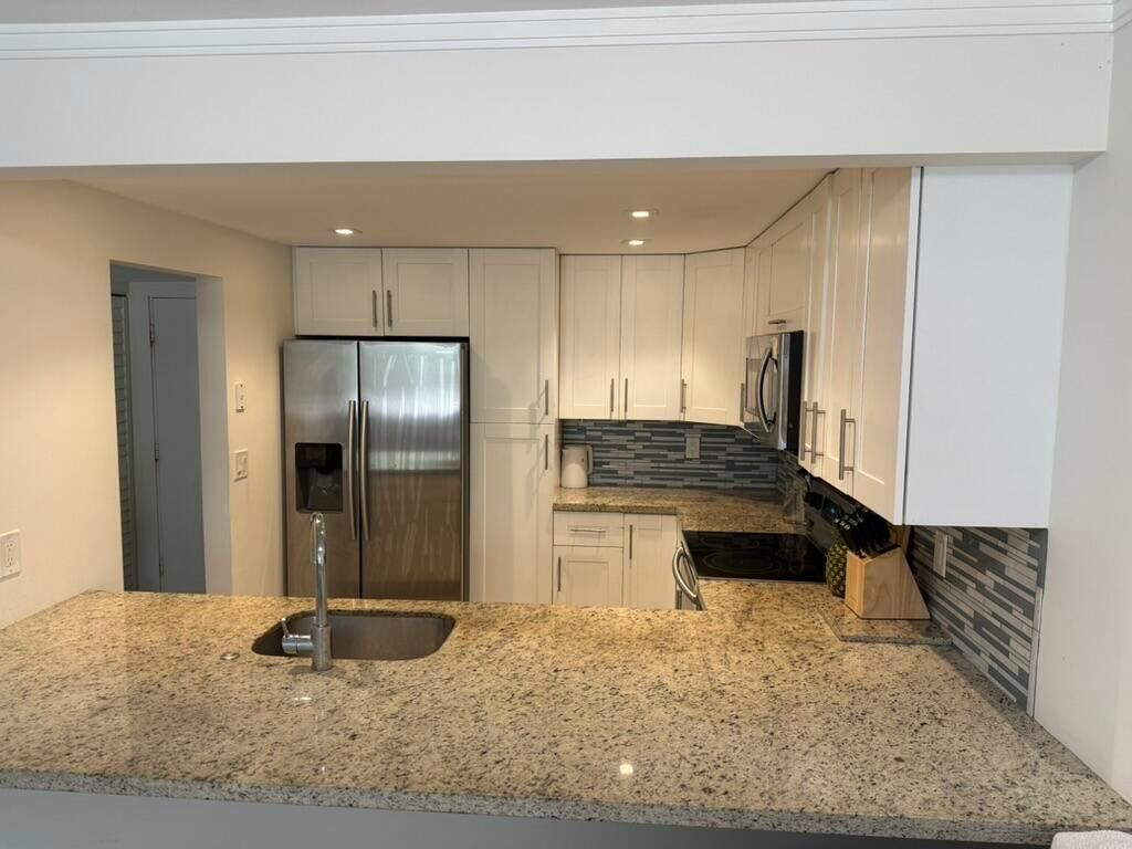 Photo of 6161 NW 2nd Avenue #Furnished, Boca Raton, FL 33487 (MLS # R11083741)