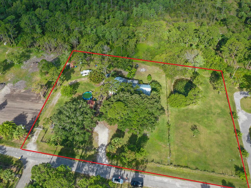 Photo of 13700 SE Ranchland Avenue, Hobe Sound, FL 33455 (MLS # R10794611)