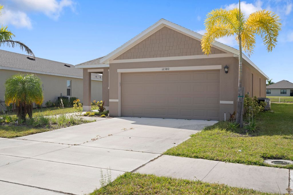 Photo of 12380 SW Rimini Way, Port Saint Lucie, FL 34987 (MLS # B26014216)