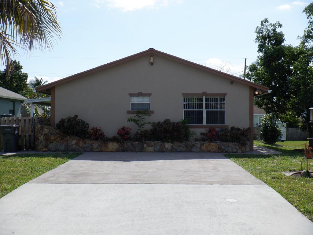 Photo of 1204 Sunset Road, West Palm Beach, FL 33406 (MLS # B26004414)