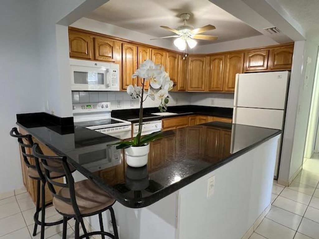 Photo of 22795 SW 66th Avenue #101, Boca Raton, FL 33428 (MLS # R11108856)