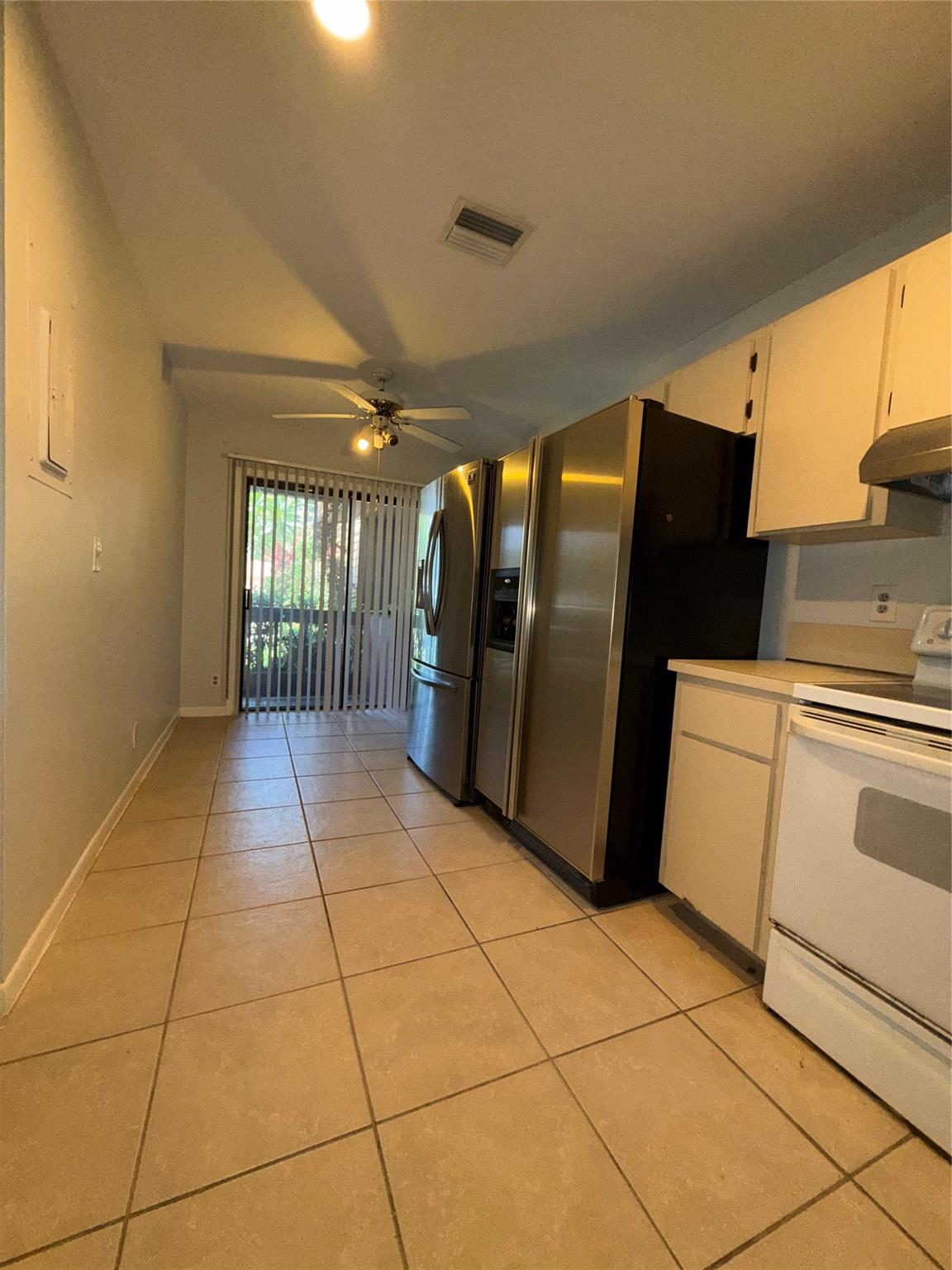 Welcome to 6180 Pine Tree Lane Unit B, a spacious 3-bedroom, 2.5-bath townhome nestled in the heart of Tamarac. This corner unit offers serene canal views, a fenced yard with lush grass and pavers, and a cozy front porch perfect for relaxing. Inside, enjoy newer appliances, central air, and in-unit laundry. With off-street parking, access to a community pool, and proximity to top-rated schools and shopping centers, this home blends comfort and convenience. Available now—schedule your showing before it’s gone