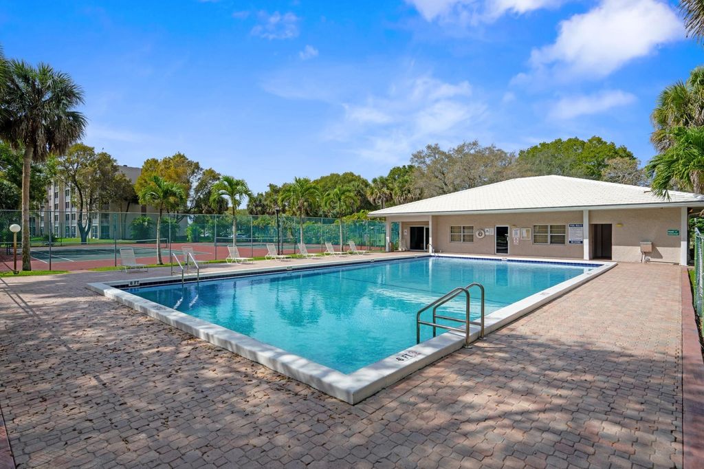 Photo of 8735 Ramblewood Drive #409, Coral Springs, FL 33071 (MLS # F10556847)