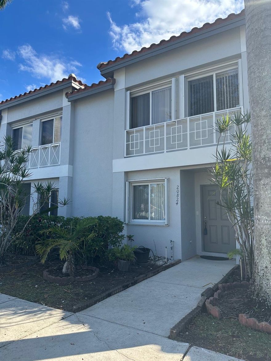 Beautiful two-story townhouse in the sought after Malibu Bay Community. Modern and cozy townhouse with 3 bedrooms and 2.5 bathrooms.  Boasting remodeled bathrooms and neutral colors throughout.  Large, screened patio, great for entertaining and outdoor living. Full size washer and dryer in the unit. Kitchen has granite countertops, stainless steel appliances and an extra pantry closet. Storage room in the entrance, great for all those miscellaneous things you have. Enjoy community pool and gym and walking distance to West Broward H.S and other private schools and academies. Neutral ceramic floors downstairs and carpet upstairs.