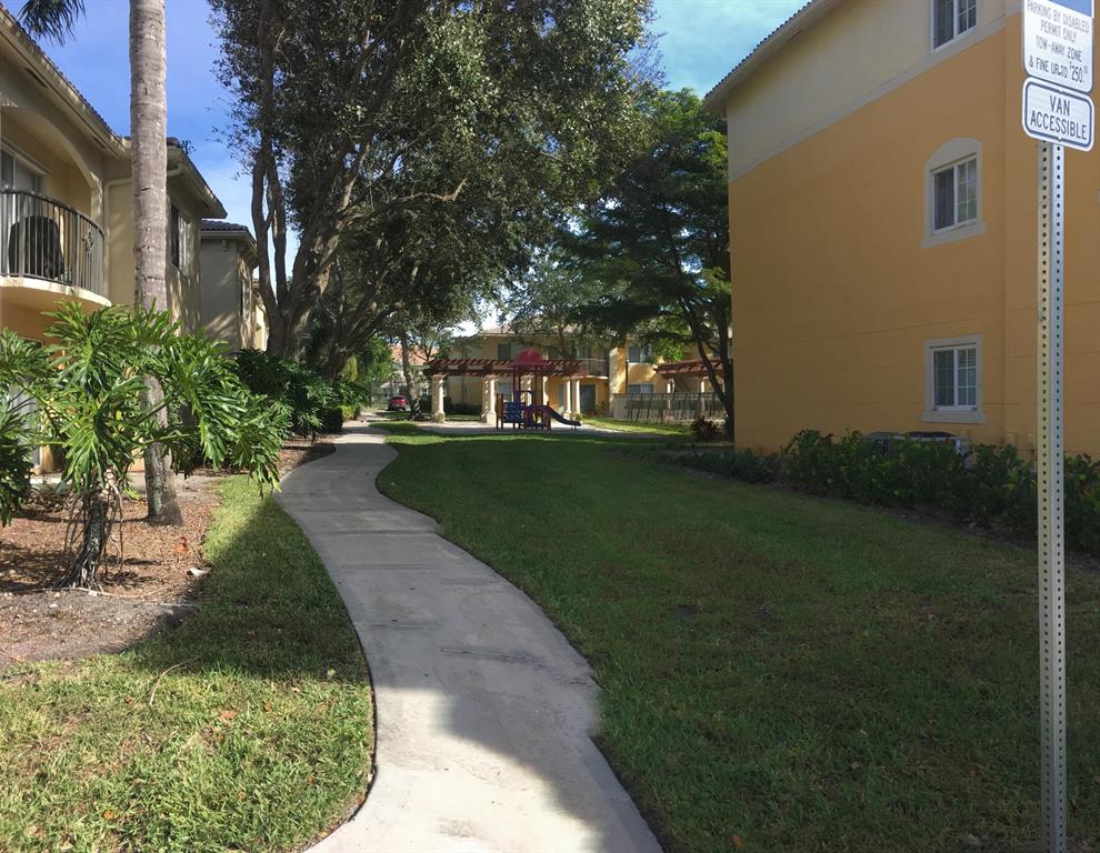 2ND FLOOR UNIT WITH GARAGE...MUST SEE!Beautiful 2 master bedroom condo with 2 bathrooms with open floor plan. Ceramic flooring throughout condo with new carpet in the bedrooms,.freshly painted, clean kitchen with granite counters and spacious cabinets. Located close to Publix, Palms West hospital, and restaurants.