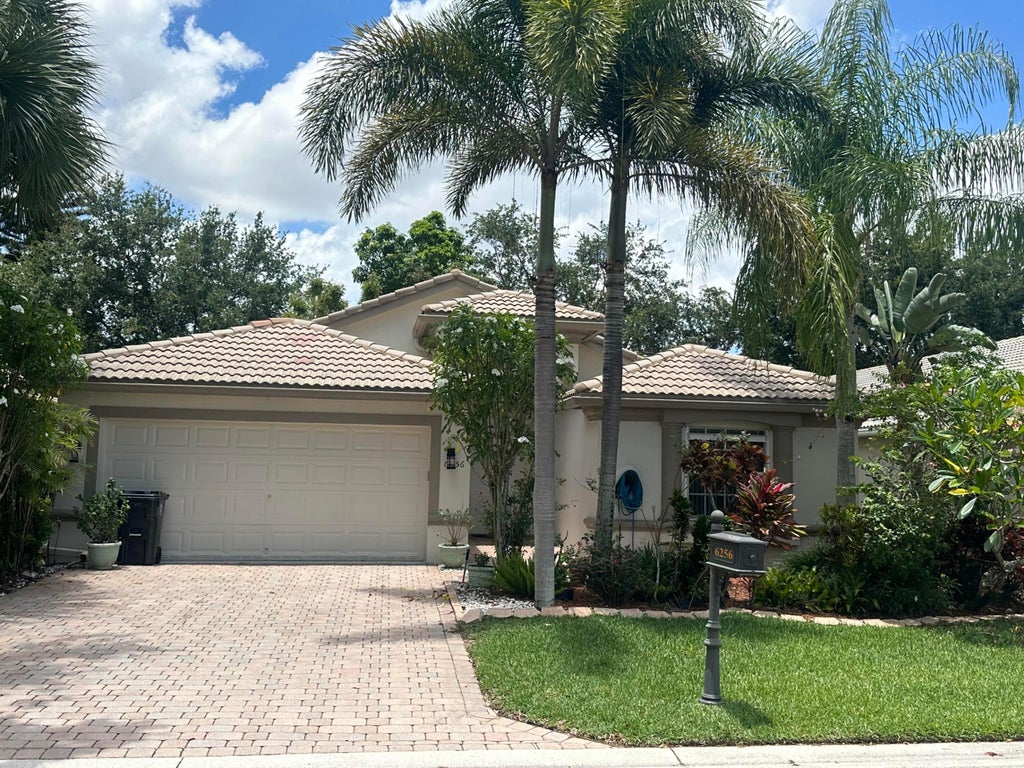 Photo of 6256 Via Primo Street, Lake Worth, FL 33467 (MLS # B26038758)