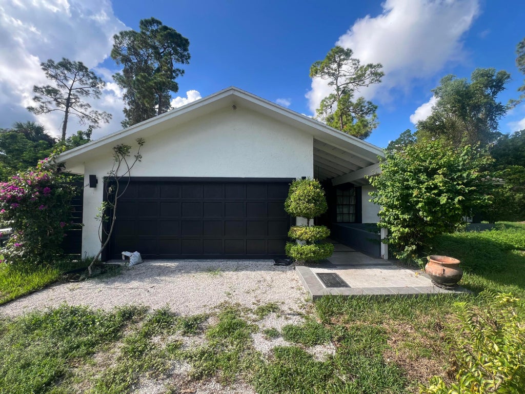 Photo of 16744 E BRIGHTON Drive E, The Acreage, FL 33470 (MLS # B26072637)