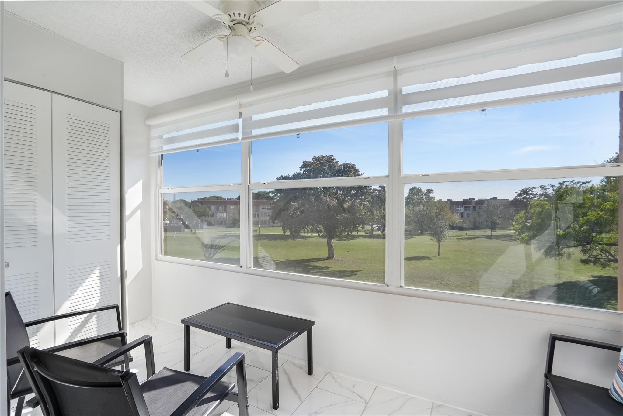 Welcome to your bright and airy 2-bedroom, 2-bathroom condo in the vibrant 55+ community of Sunrise Lakes.
Enjoy beautiful and thoughtful renovations that include stunning white kitchen, new tile and laminate flooring, recessed lighting, newer baseboards and crown molding, updated bathrooms, and a beautiful enclosed balcony to enjoy the golf course view with the lake. Newer AC from 2021. Take advantage of the community amenities featuring a large clubhouse, pools, a fitness center, shuffleboard, scenic walking paths, golf course, and more.