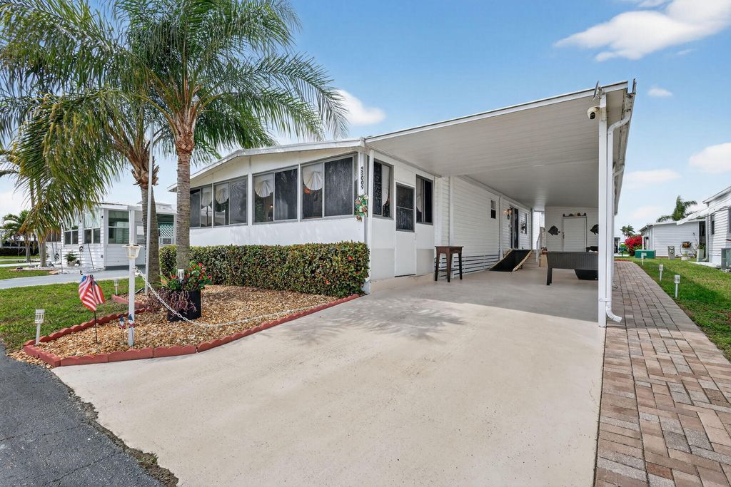 Photo of 53009 Del Rio, Boynton Beach, FL 33436 (MLS # B26003541)