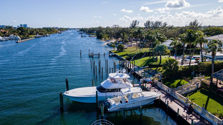 Motivated Seller Go to Documents for Floor Plan.YACHTSMAN'S private deep water ICW estate w/dockage for 70' vessel + add'l boat. Tantalizing collection of amenities awaits behind the iron gated entrance providing security & privacy. Tucked away on lush grounds, the estate was designed for a connoisseur of fine living & entertaining; Commanding 2-story main home, water views from nearly every room. A GUEST House, large patio, pool/spa, & huge waterfront Tiki Bar. Brick paver path leads to docks providing ocean access w/no fixed bridges. Elegant interiors offer the ultimate layout filled with luxe amenities for relaxing, entertaining or enjoying an active lifestyle. Grande gourmet kitchen w/ 6-burner gas stove, formal Dining Room, centrally located Wet Bar, 1st floor Primary Bedroom Suite