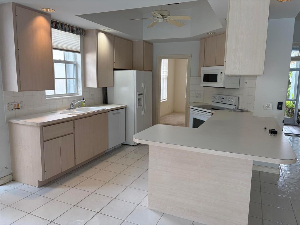 Photo of 284 NW Bentley Circle, Port Saint Lucie, FL 34986 (MLS # B26009232)