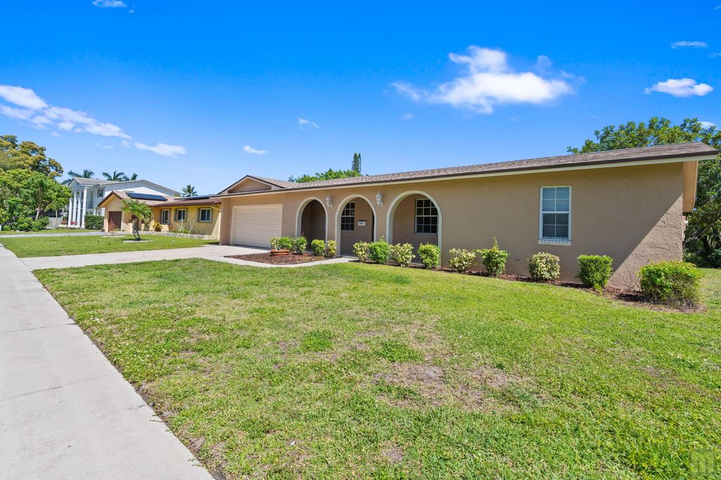 Photo of 260 Lake Drive, Coconut Creek, FL 33066 (MLS # B26011590)