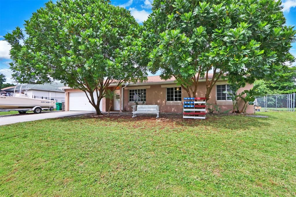 Photo of 1981 SW Agnes Street, Port Saint Lucie, FL 34953 (MLS # R10726749)