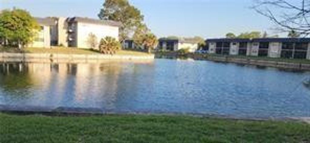 Photo of 8020 N Colony Circle #110, Tamarac, FL 33321 (MLS # F10549483)