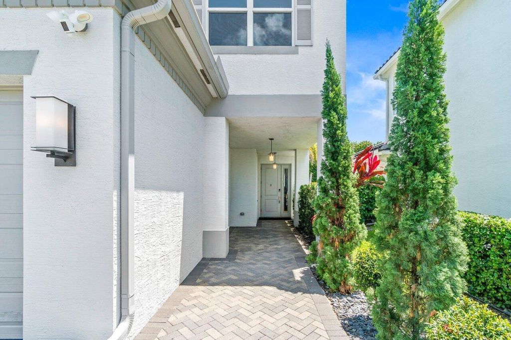 Photo of 9610 Sterling Shores Street, Delray Beach, FL 33446 (MLS # R11094589)