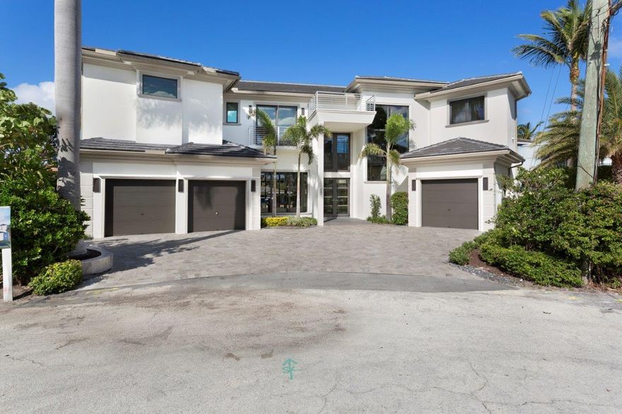 Brand New Modern Waterfront Estate located in Harbour East, one of Boca Raton's secluded waterfront enclaves. Just one home off the intracoastal, this home fronts 137' of water with a 50'pool, spa, summer kitchen and large covered loggia overlooking a 100'dock equipped with a new boat lift. The interior has high ceilings, large open rooms with walls of glass, a beautiful kitchen, family room, and a separate library all overlooking the waterway. The gorgeous upstairs master suite has stunning water-views and a private covered terrace. There are 4 additional family bedrooms each with its own bath as well as and upstairs office/yoga room.  Seller will consider owner financing or a lease purchase contract for a qualified buyer.