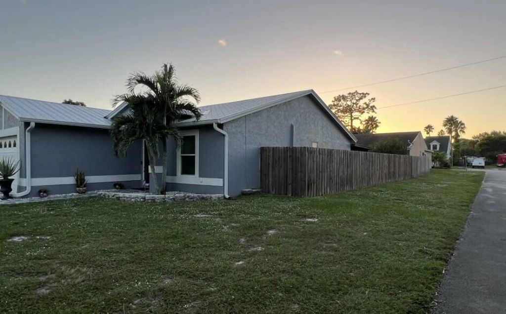 Photo of 5843 SE Grafton Drive, Stuart, FL 34997 (MLS # R10942888)