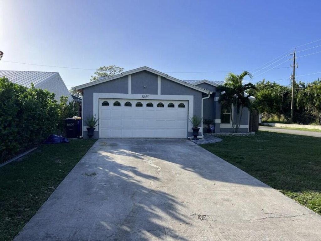 Photo of 5843 SE Grafton Drive, Stuart, FL 34997 (MLS # R10942888)