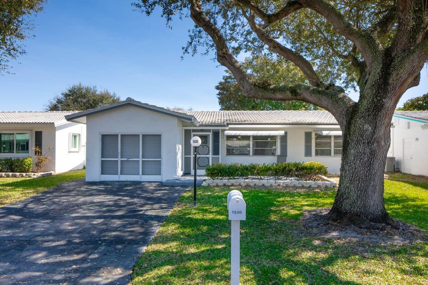 Beautifully remodeled two bedroom two bath home located in a desirable 55 and over community in Plantation. This bright open floor plan offers a spacious living area with a large mounted TV perfect for relaxing or entertaining. The brand new kitchen features modern cabinetry quartz countertops and a new stove along with updated appliances throughout. Both bathrooms have been tastefully renovated and the home includes a brand new washer and dryer for added convenience. Enjoy low maintenance living with lawn service pest control and basic cable included in the rent. Move in ready and thoughtfully updated this home offers comfort style and ease in a well maintained adult community.