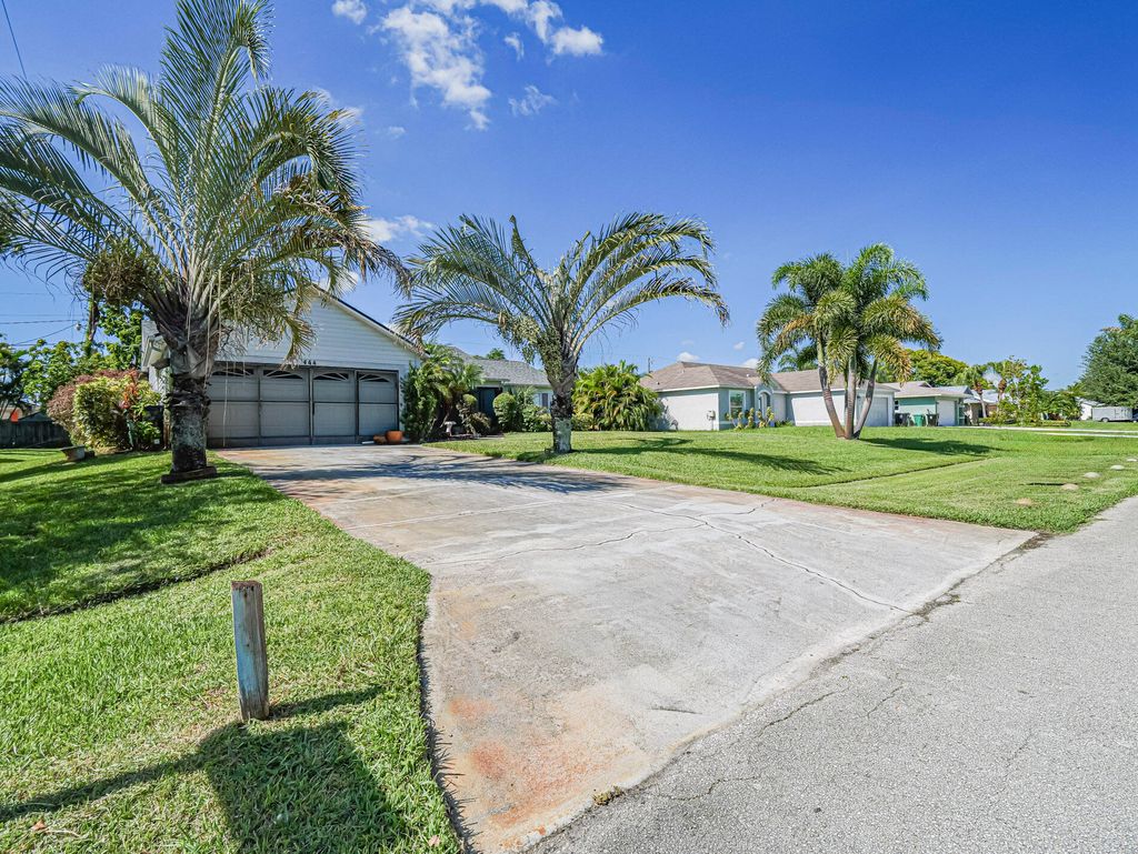 Photo of 444 SW Dolores Avenue, Port Saint Lucie, FL 34983 (MLS # R11158085)