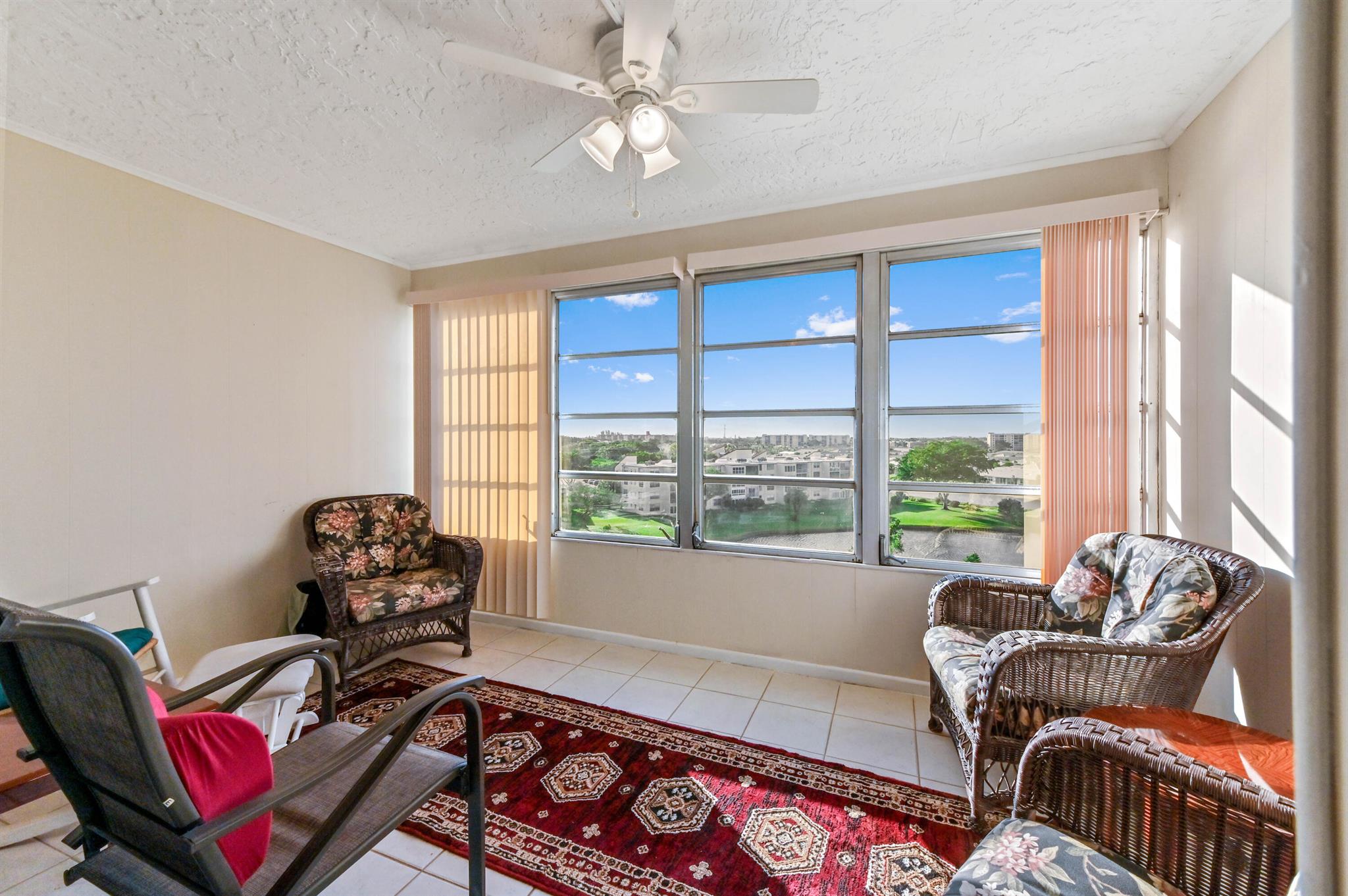 Experience million-dollar views from this one-of-a-kind penthouse on the 7th floor. This stunning 1-bedroom, 2-bath, 925 sq. ft. apartment features a Florida room for added living space, perfect for relaxation or hosting guests. Make it your ideal seasonal retreat or a full-time oasis. The lake view and sunsets are mesmerizing all year round.Fully equipped with a sleep sofa, adjustable bed, 65'' flat-screen TV, and much more. The unit includes brand new washer dryer, hot water heater, and Accordion shutters. Floors have ceramic tile (primary has carpet). There is plenty of storage inside and outside of the unit. The assigned parking spot is the closest you can get. Enjoy the clubhouse amenities, including tennis,library/game room, resort style pool, fitness center, shaded cabanas