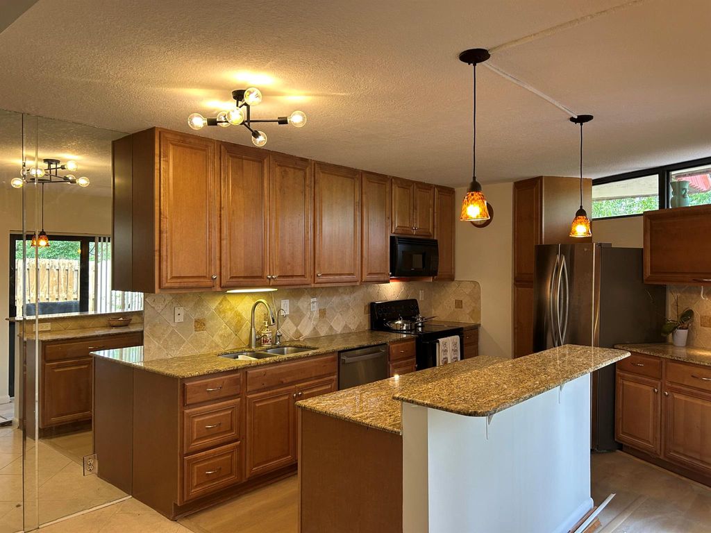 Photo of 3828 Victoria Drive, West Palm Beach, FL 33406 (MLS # R11032376)