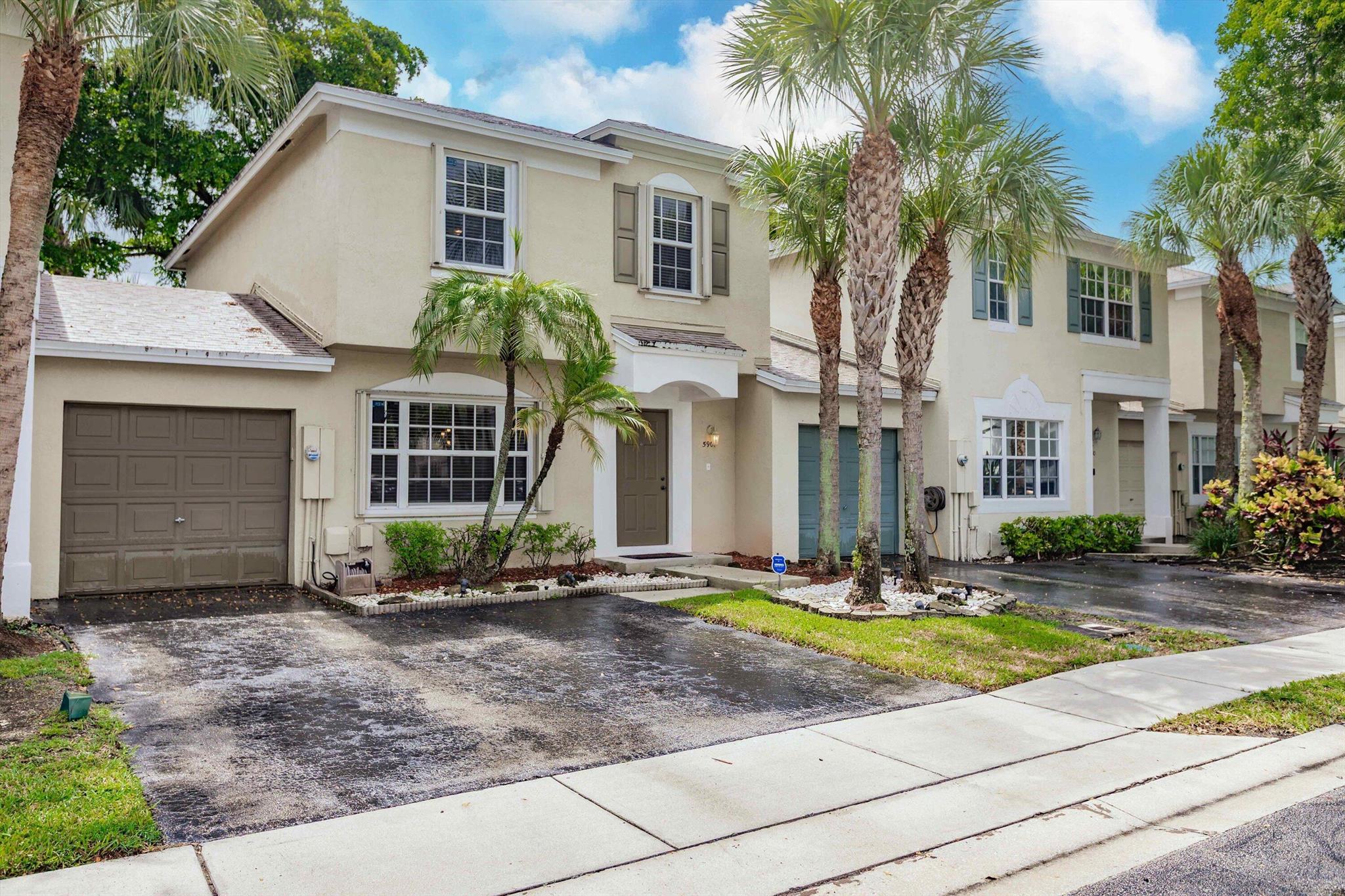 Welcome to your dream home in Tamarac! This charming 3-bedroom, 2.5-bathroom townhouse blends modern style and comfort. Enjoy a sleek kitchen with stainless steel appliances, a luxurious primary suite with a glass shower and dual vanity, and a spacious open-porch backyard new deck and pergola for entertaining. The community offers a pool, tennis and pickleball courts, and playground for the kids, perfect for all ages. Located minutes from the Sawgrass Expressway and premier shopping and dining at Sawgrass Mills Mall, this home ensures convenience. With low HOA fees, it's an affordable gem that is ideal for relaxing as well as entertaining. Don't miss this vibrant townhouse--schedule your tour today!